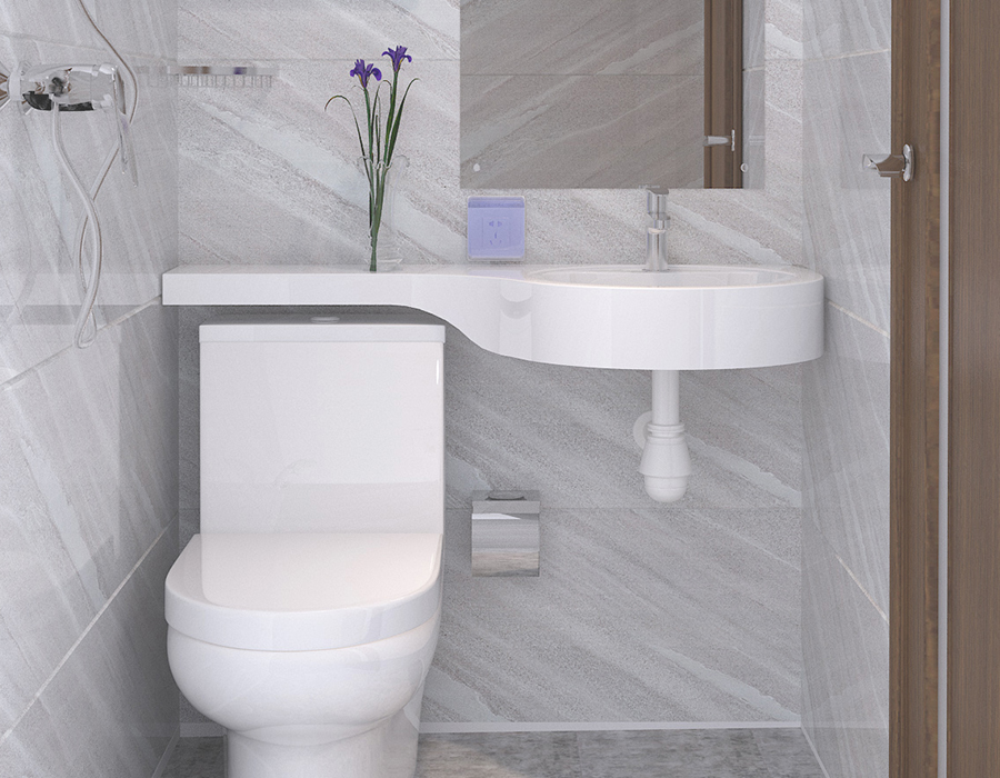Salle de bains intégrée au logement social avec structure en panneaux de fibres entièrement en résine