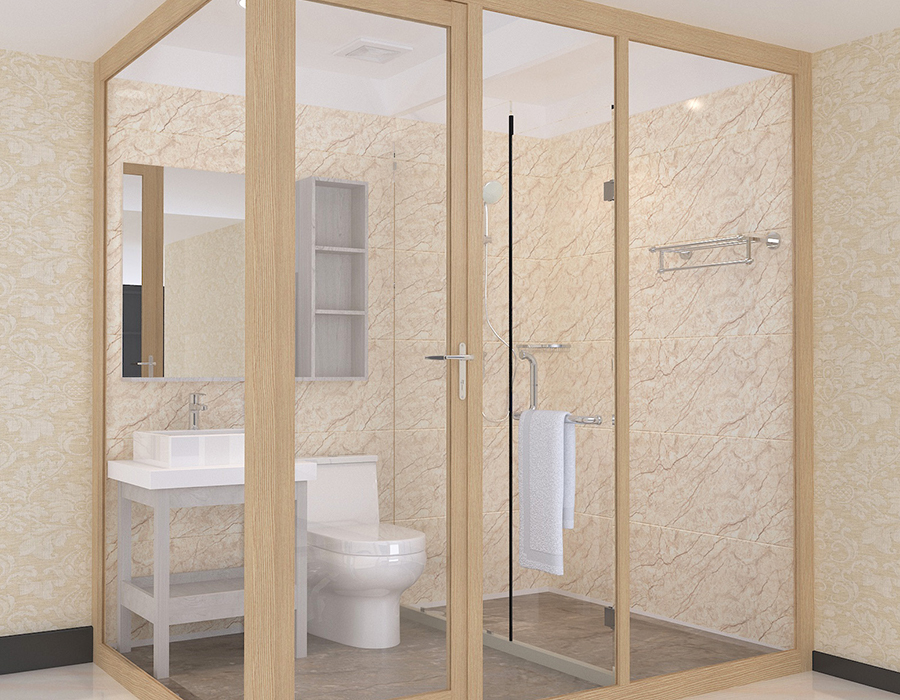 Salle de bain intégrée dans un dortoir avec panneaux intérieurs en fibre de résine PEC et murs extérieurs en verre